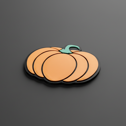 Pumpkin-shaped drink coaster on a dark gray background